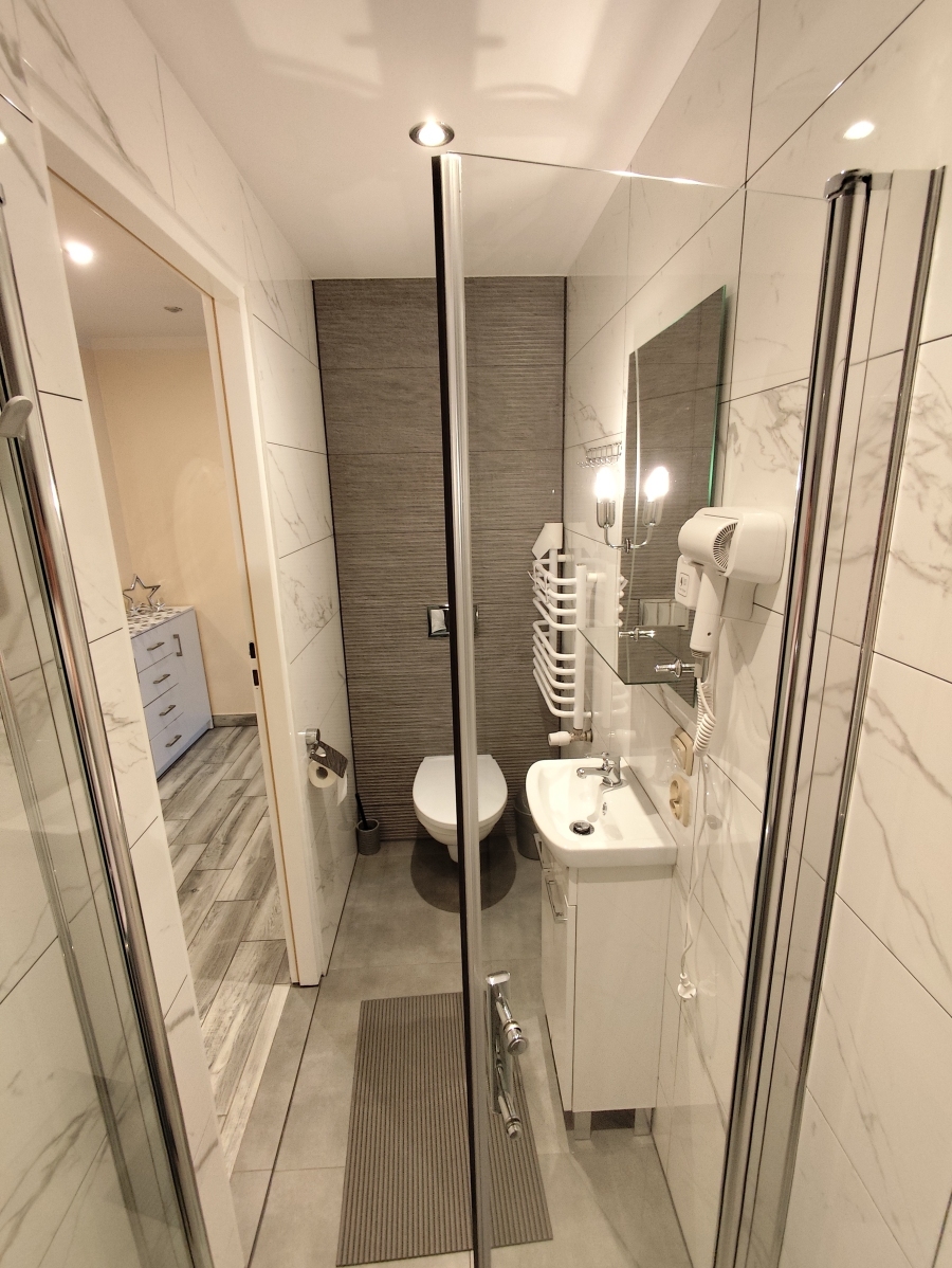 Łazienka w apartamencie 
 nr 7A